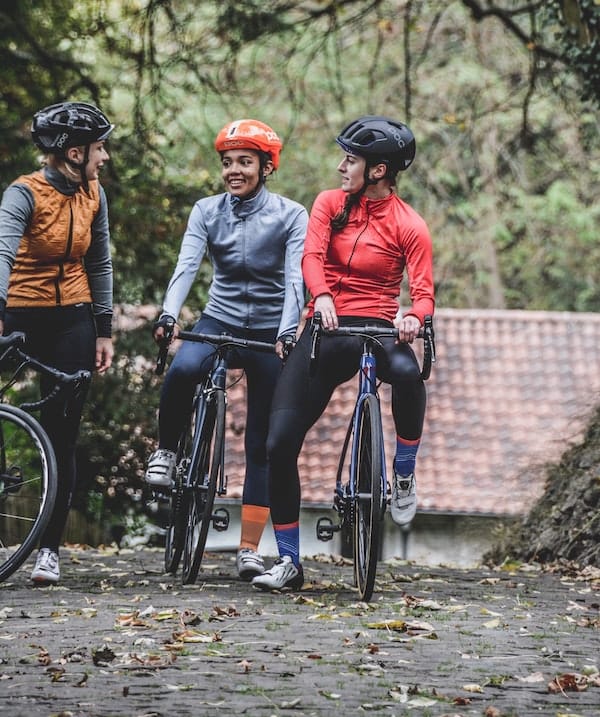 Three cyclists in the woods